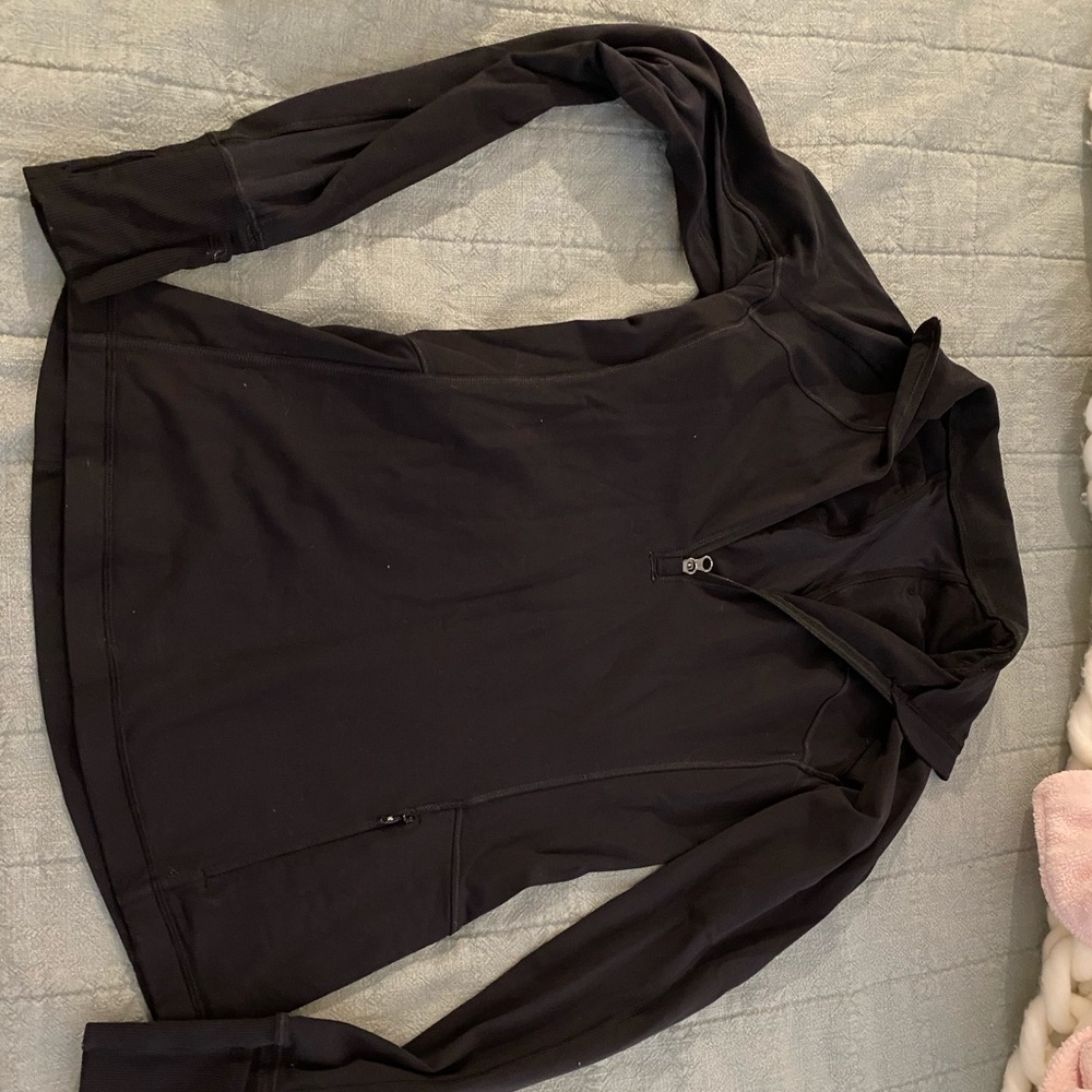 Never worn Lululemon black half zip jacket size 4